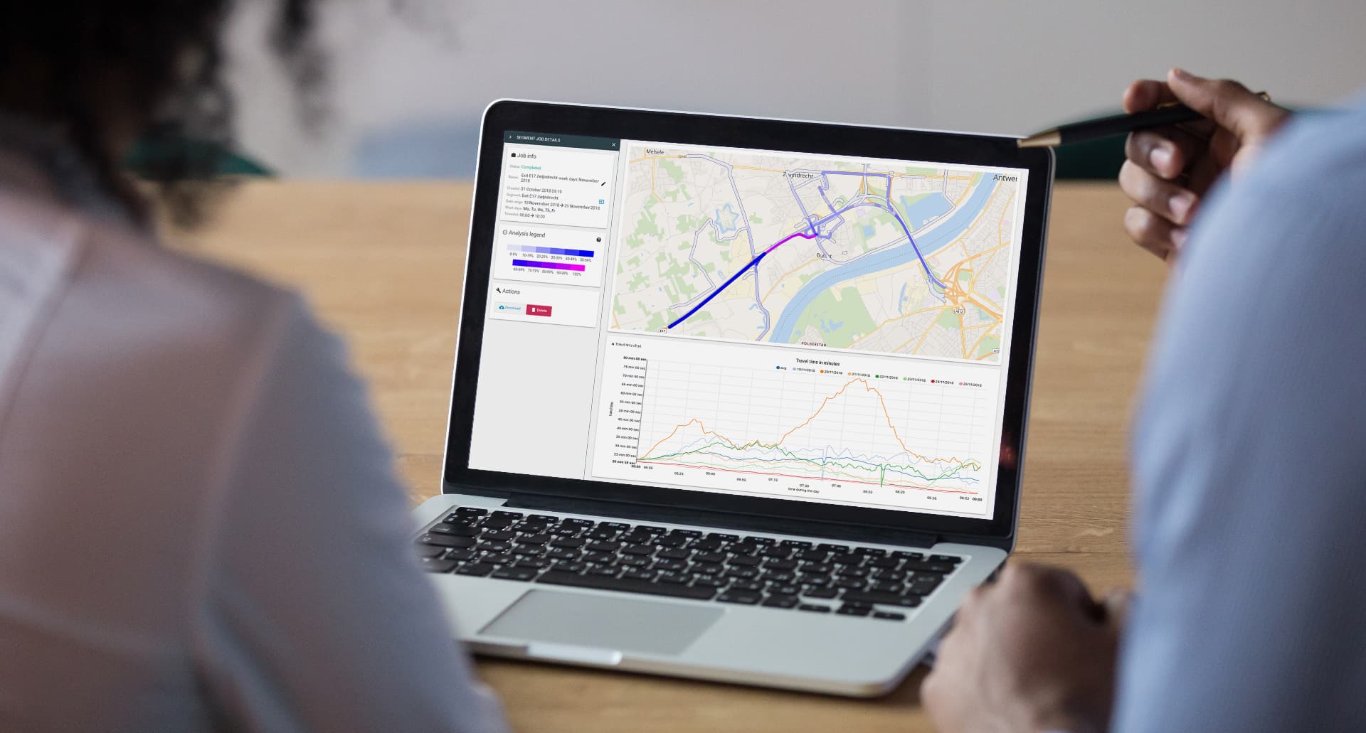 FlowCheck traffic analysis interface showing a map with coloured corridor visualisation and travel-time graphs