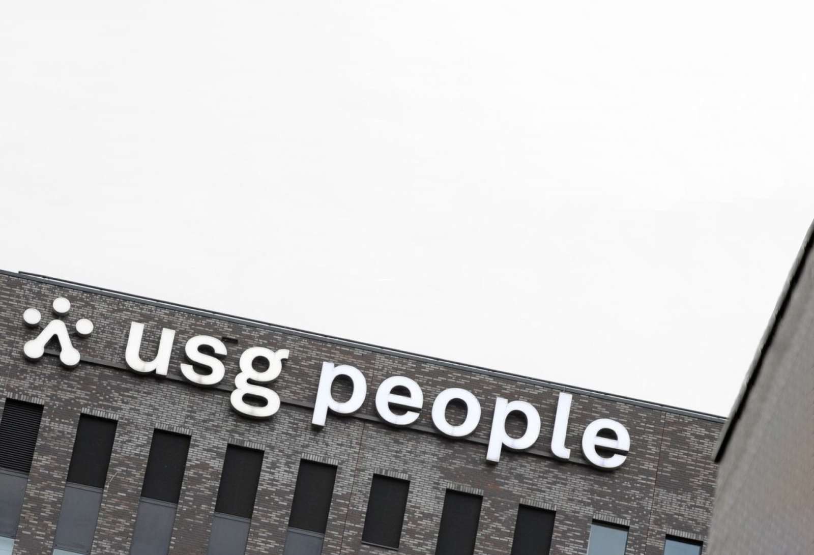 USG People signage on an office building.
